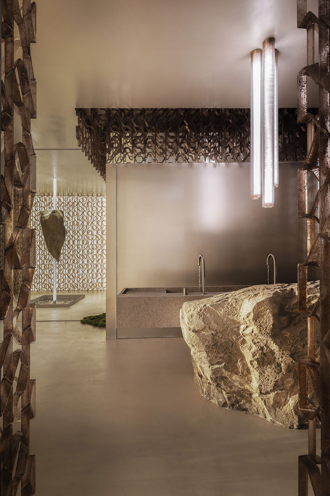 casa decor 2025 calzi studio baño publico propuesta innovadora con piedra y metal